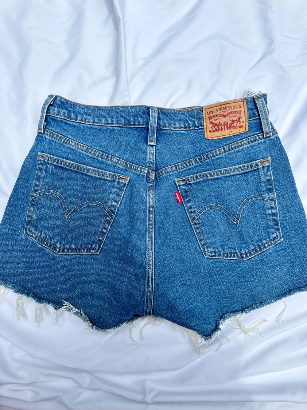 Levi's Blue Denim Cutoff Shorts with Frayed Hem